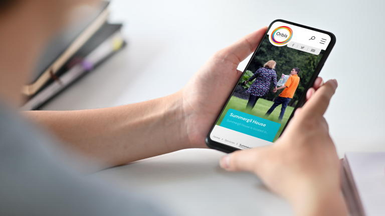 Orbis Education & care website viewed on mobile